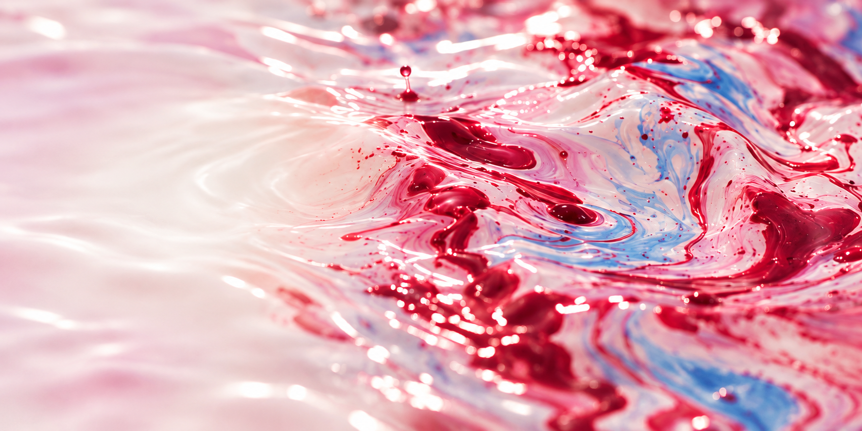 Rose and blue lacquer flowing on the water surface